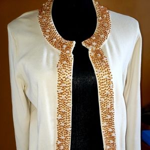 Sweater embellished. Hidden eyelet closure